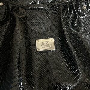 Anne Klein Black Patent Snake-Embossed Handbag with Metal Logo
